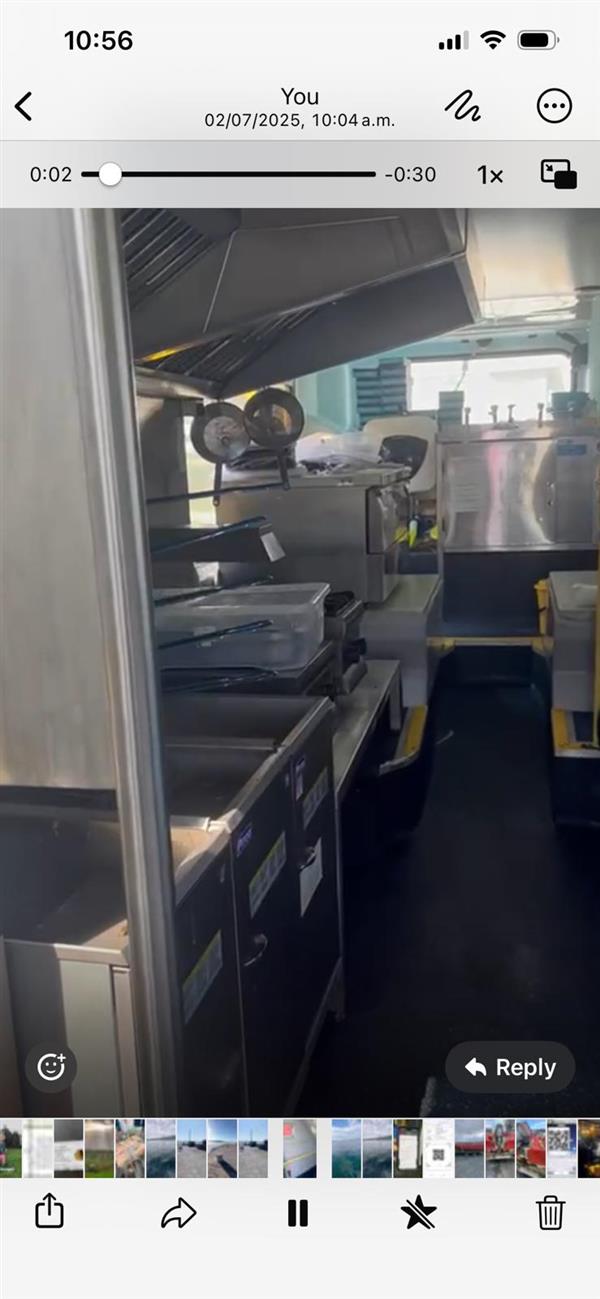 Mobile fish and chip ship with upper deck dining area.