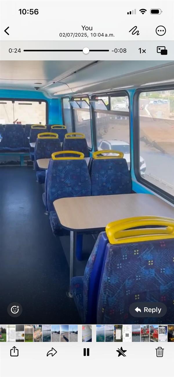 Mobile fish and chip ship with upper deck dining area.
