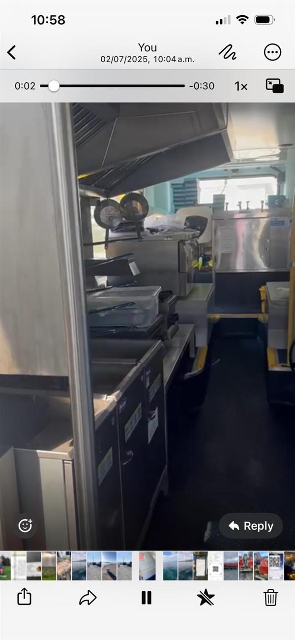 Mobile fish and chip ship with upper deck dining area.